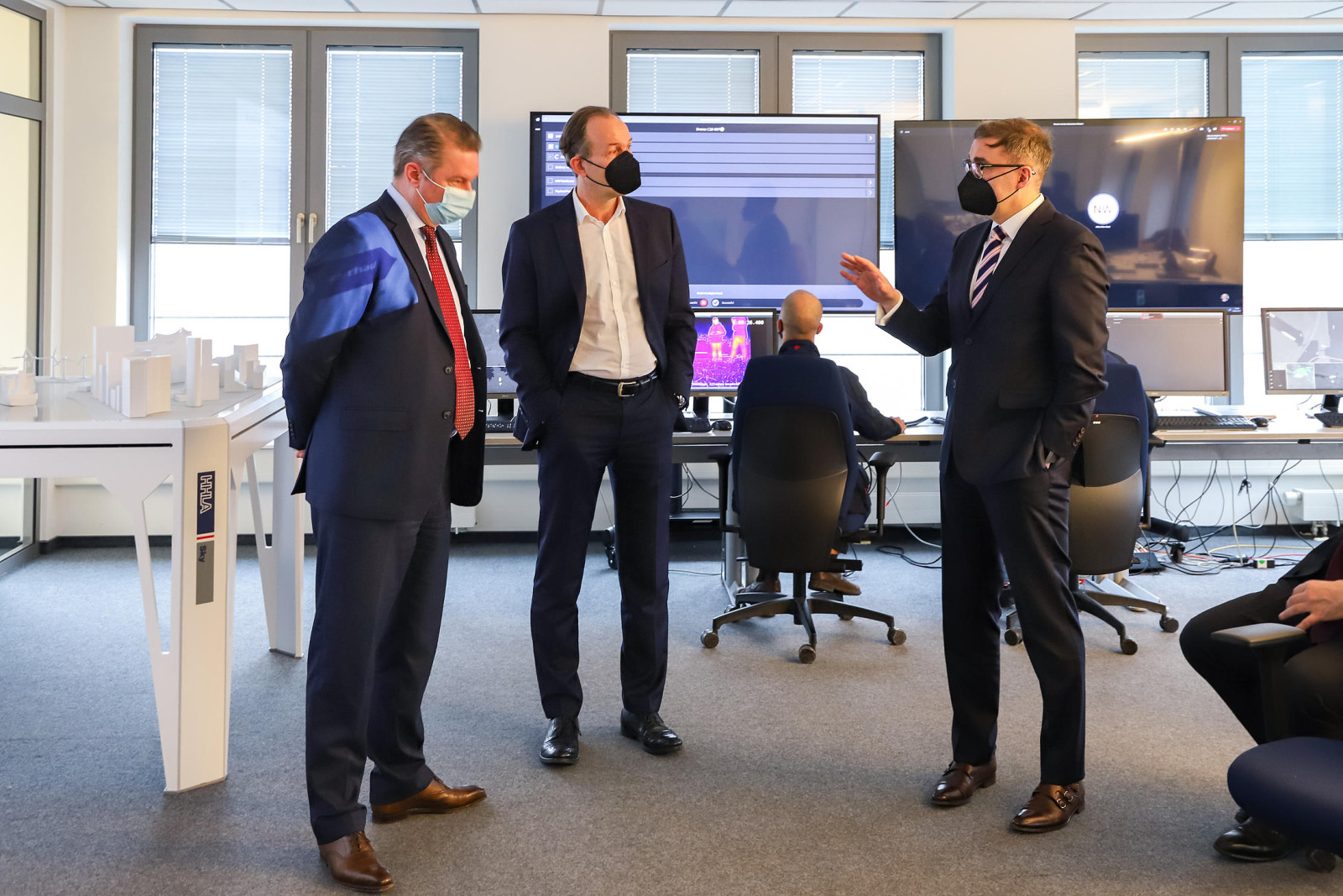 Group of people talking in an office space