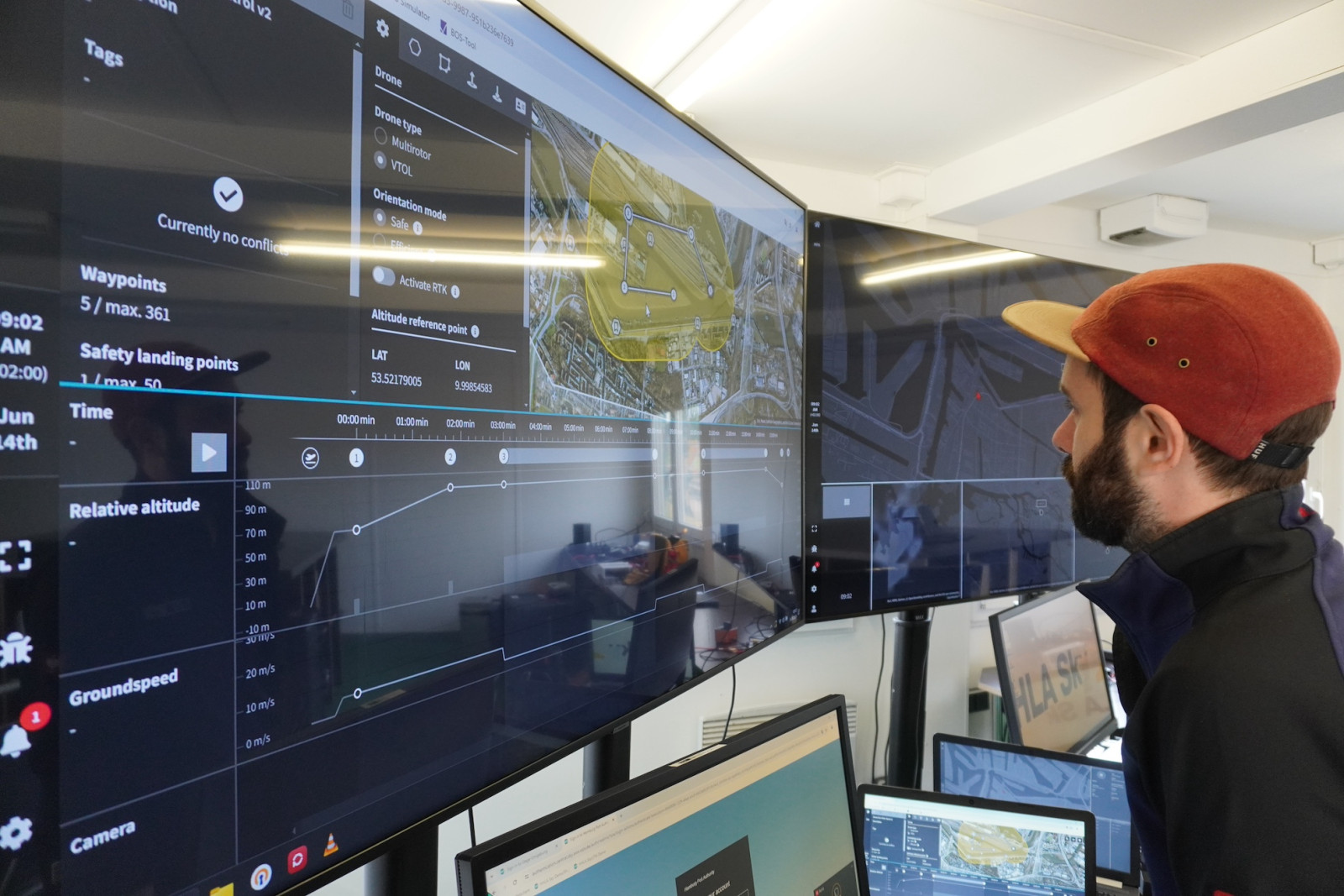 Person watching a drone control screen
