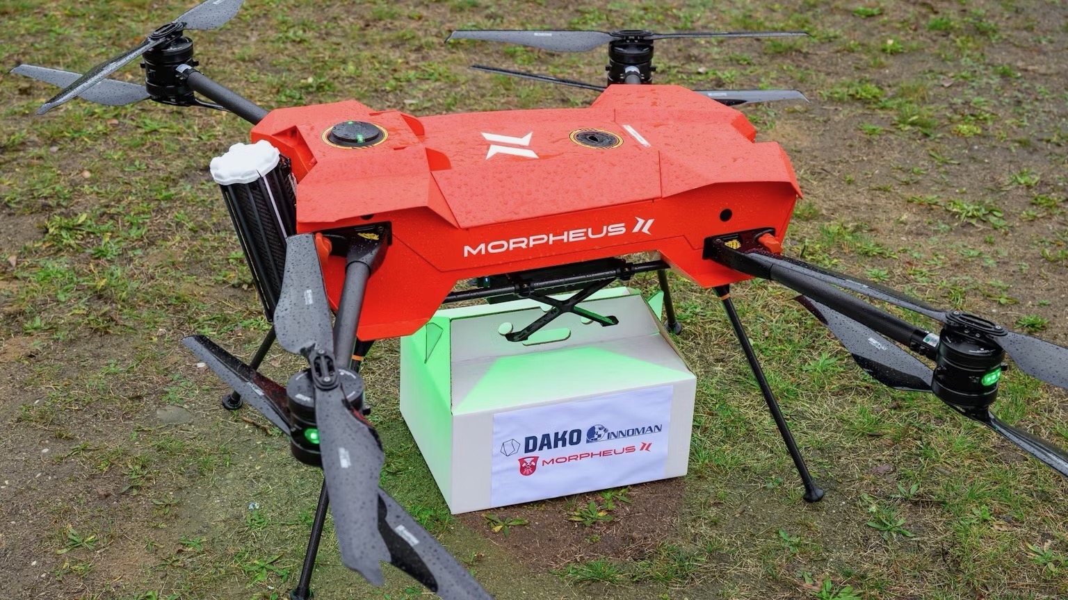 Morpheus drone carrying a package