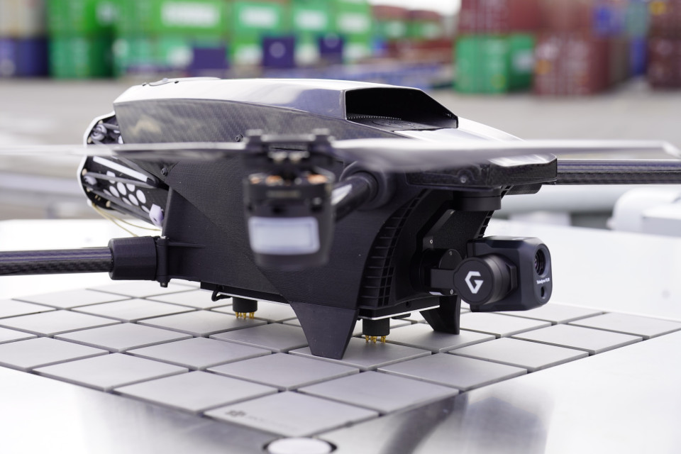Drone landing on a charging connector