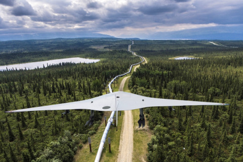 A BVLOS operating VTOL drone is monitoring a gas pipeline that runs through Canadian forests and mountains